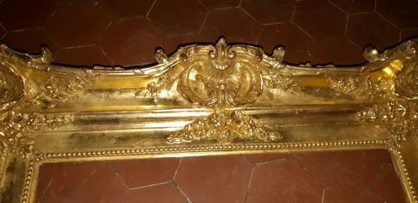 Cadre époque 20 ème, en bois doré.