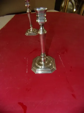 Paire de chandeliers époque début 20 ème, en métal argenté.