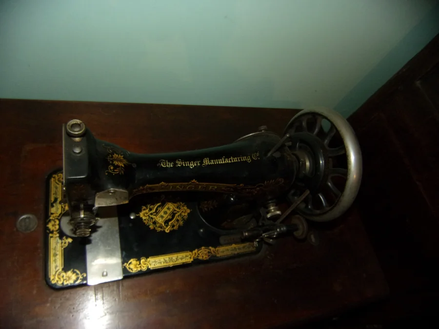 Singer Sewing Machine, With Cabinet, 20th Century.
