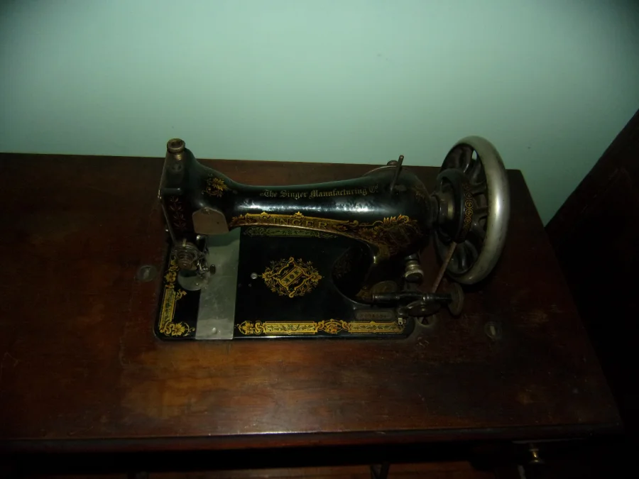 Singer Sewing Machine, With Cabinet, 20th Century.