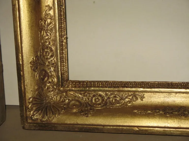 Paire de cadres époque 19ème en bois doré.