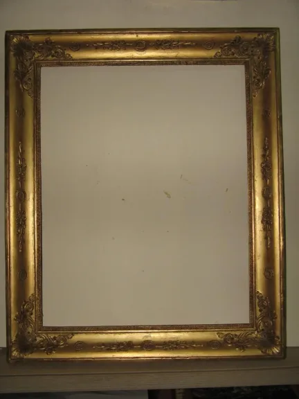 Paire de cadres époque 19ème en bois doré.
