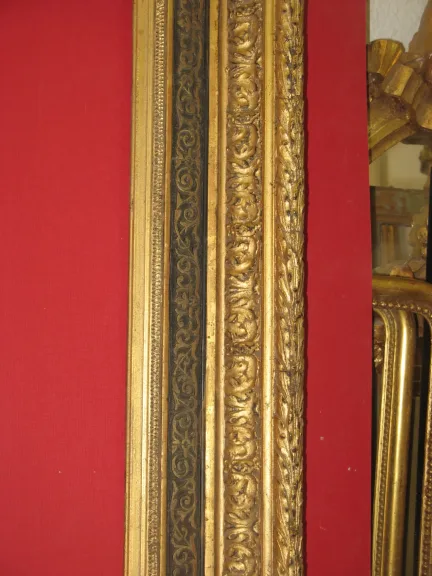 Cadre époque 19 ème en bois doré.