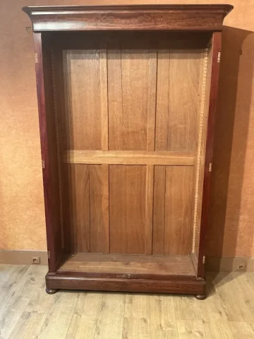 Une Bibliothèque en acajou.