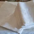 Nappe et ses 12 serviettes en damassé fin XIXème