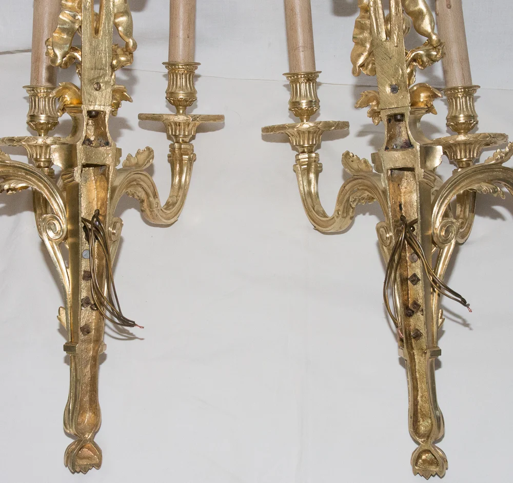 Paire d'appliques en bronze style Louis XVI circa 1880