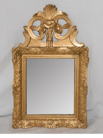 Miroir en bois sculpté et doré début XIXe siècle