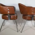 Paire de fauteuils en skaï années 50-60