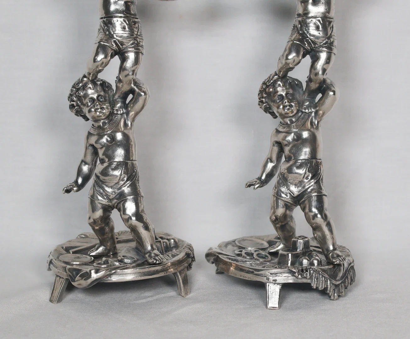 PAIR OF SILVER PLATE CANDLESTICKS