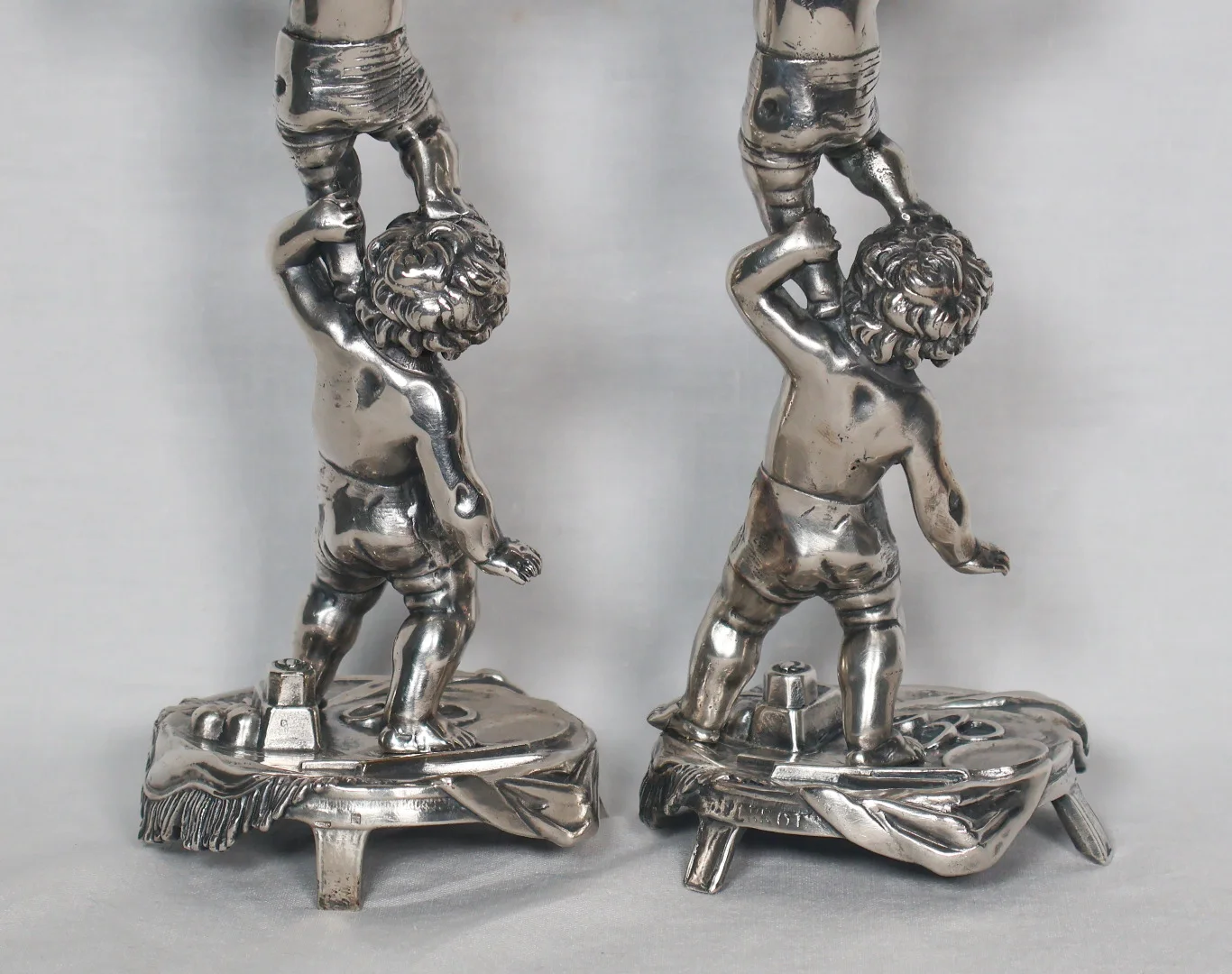 PAIR OF SILVER PLATE CANDLESTICKS