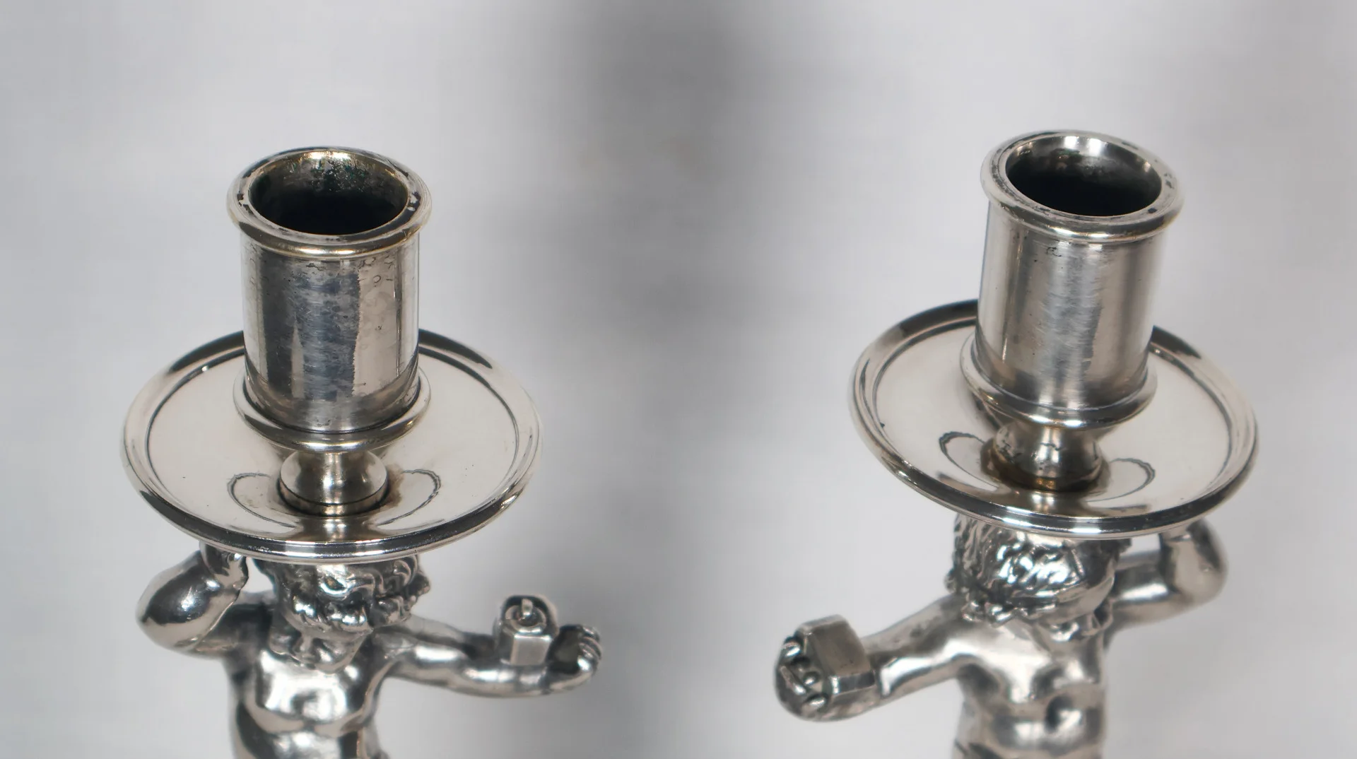 PAIR OF SILVER PLATE CANDLESTICKS