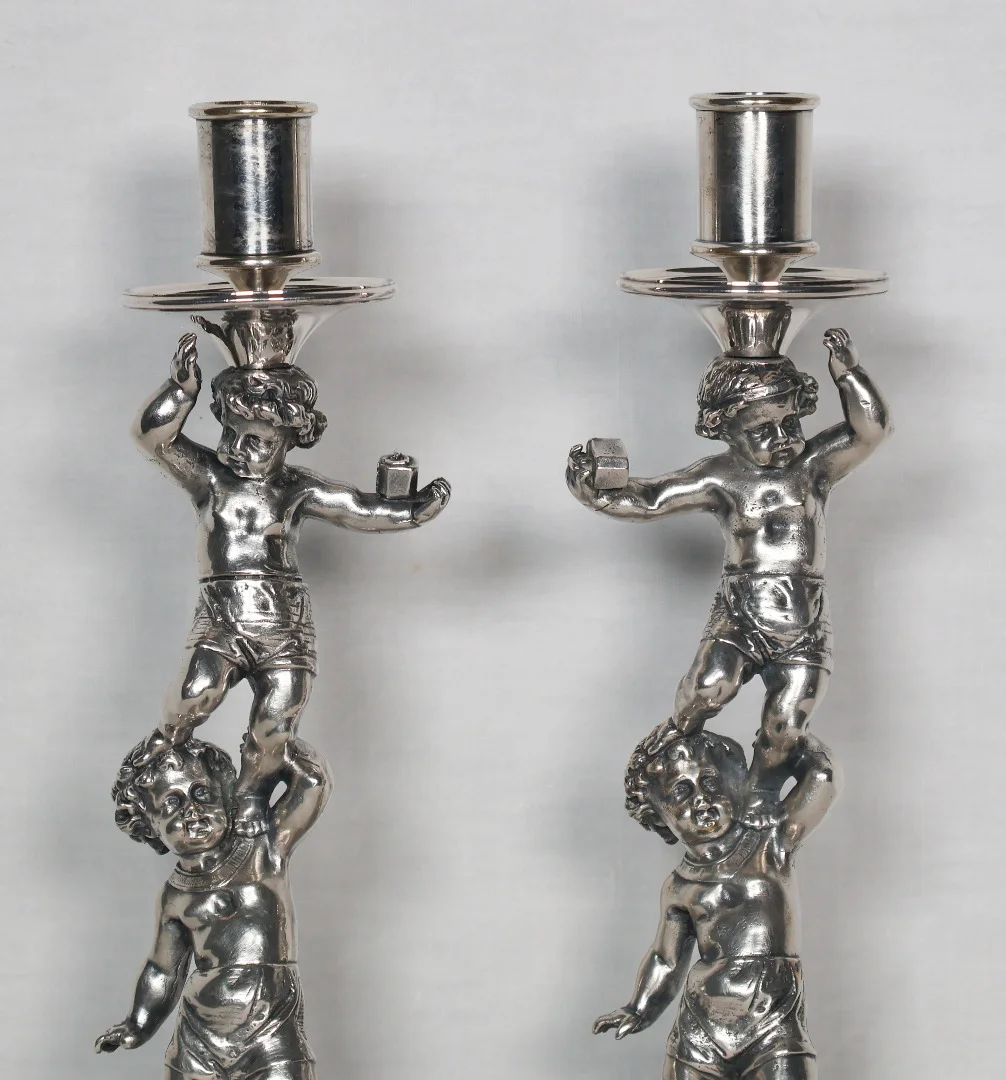 PAIR OF SILVER PLATE CANDLESTICKS