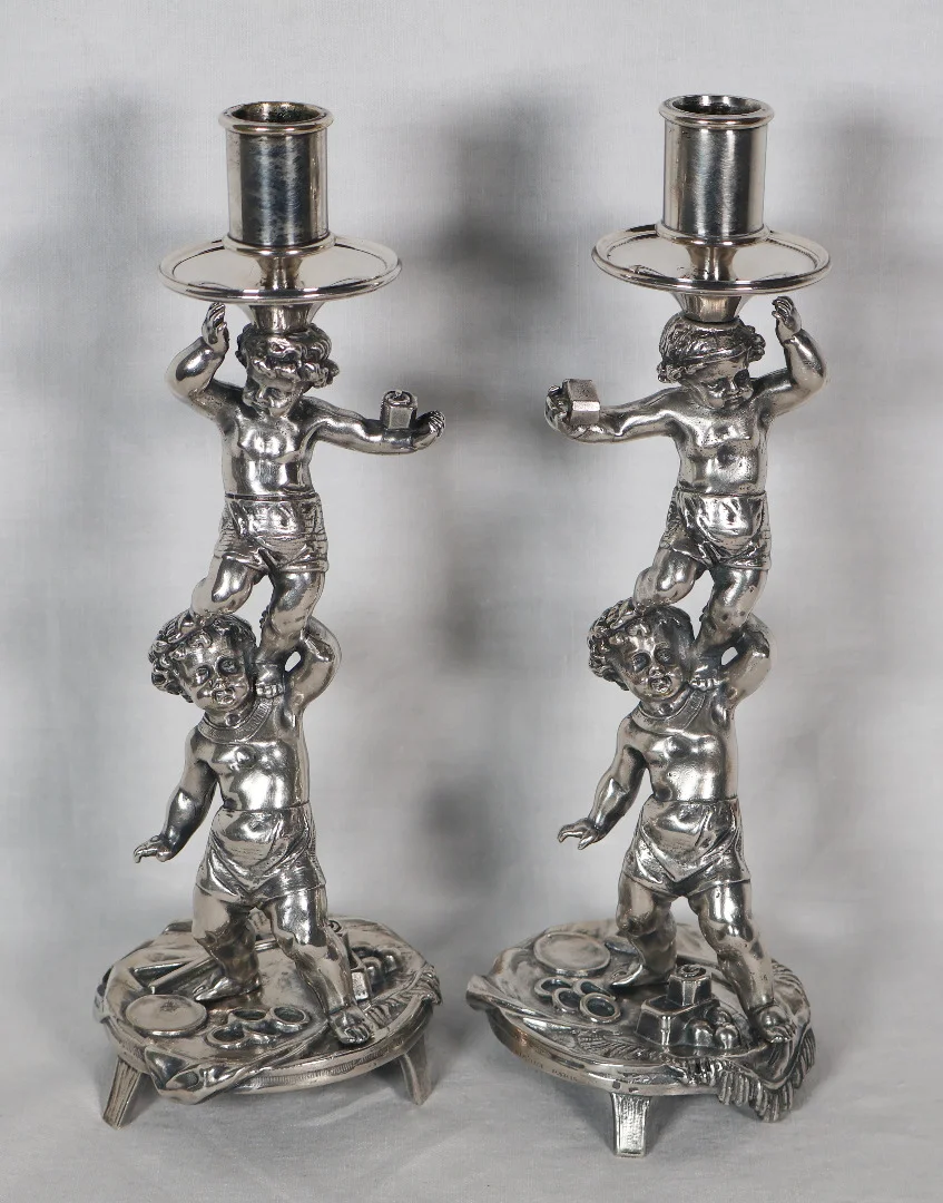 PAIR OF SILVER PLATE CANDLESTICKS