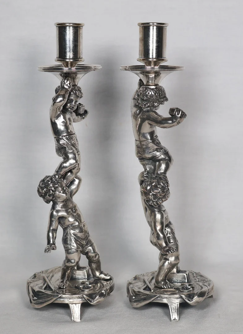 PAIR OF SILVER PLATE CANDLESTICKS