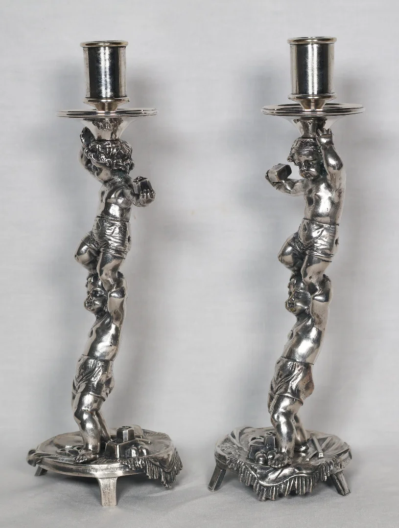 PAIR OF SILVER PLATE CANDLESTICKS