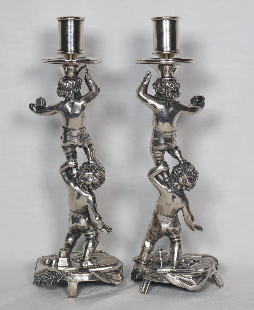PAIR OF SILVER PLATE CANDLESTICKS