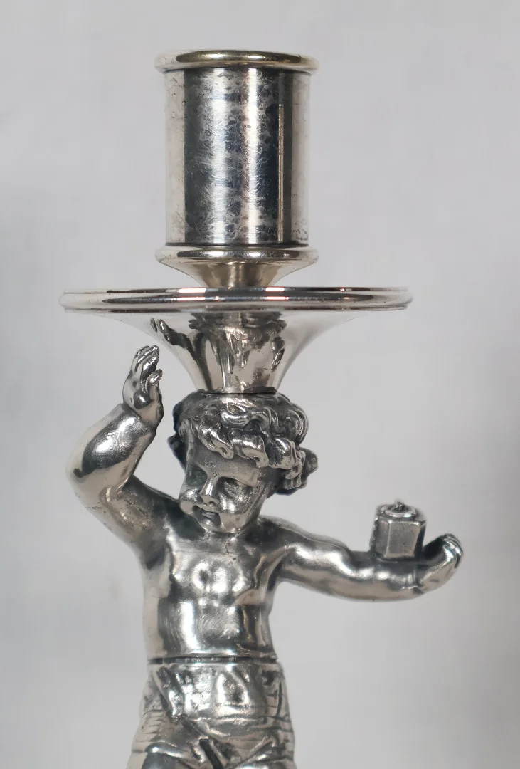 PAIR OF SILVER PLATE CANDLESTICKS