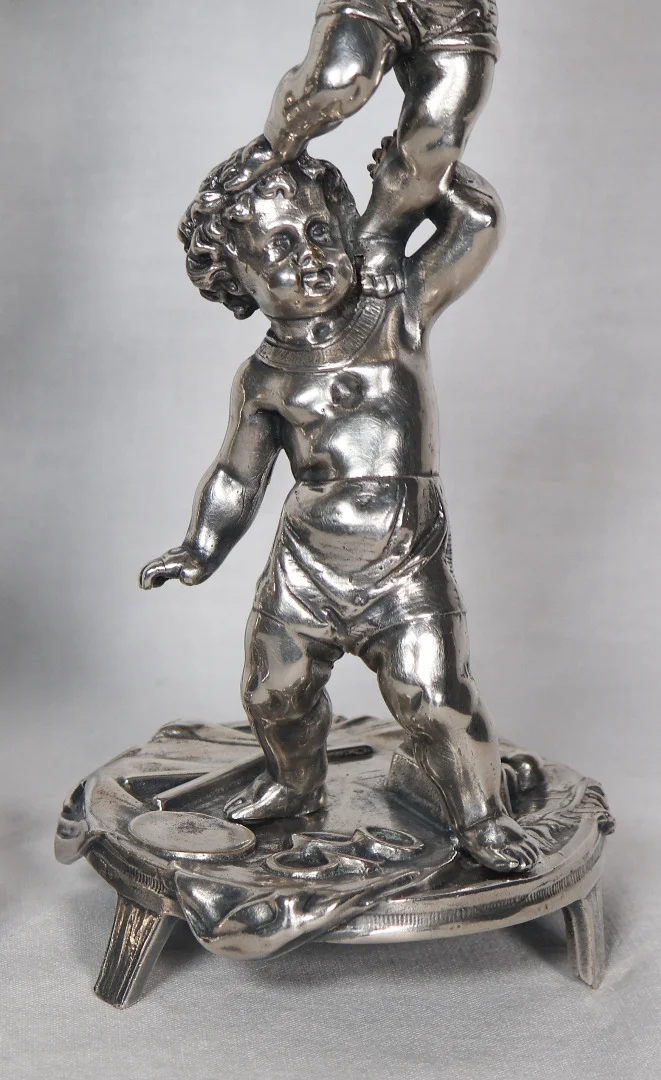 PAIR OF SILVER PLATE CANDLESTICKS