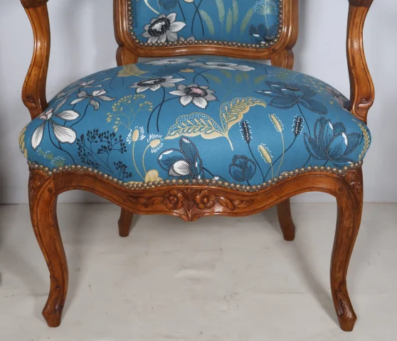 Pair of cabriolet armchairs stamped NOGARET, circa 1750