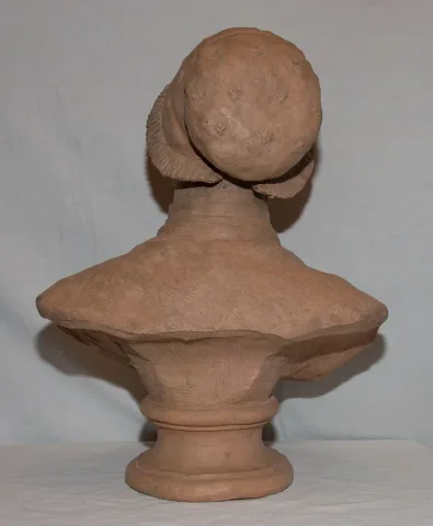 Buste en Terre signé R. Chassaigne et daté 1881