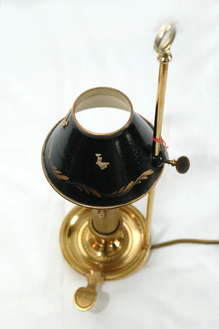 Lampe bouillotte  a un bras de lumiére