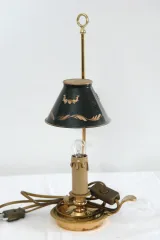 Lampe bouillotte  a un bras de lumiére