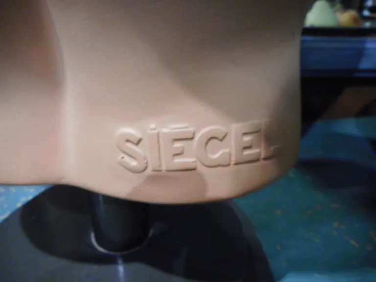 SIEGEL BUST