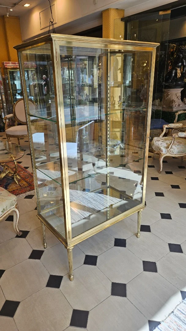 Brass and bronze display cabinet. Early 20th century.