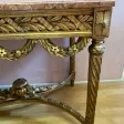 Table de milieu Louis XVI,en bois doré