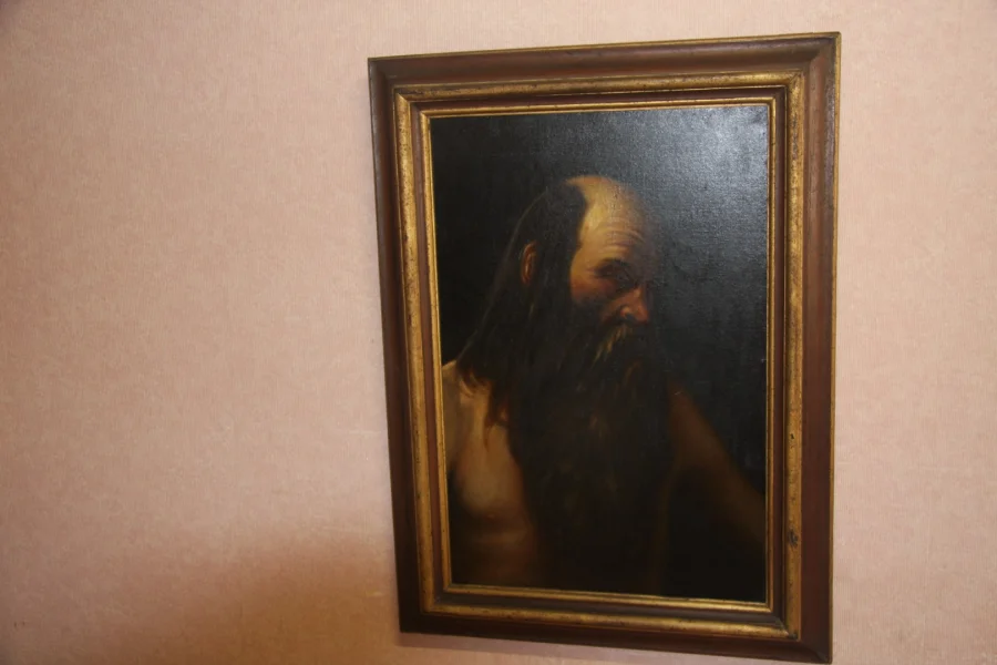 Huile sur toile présentant un ermite. Très bon état