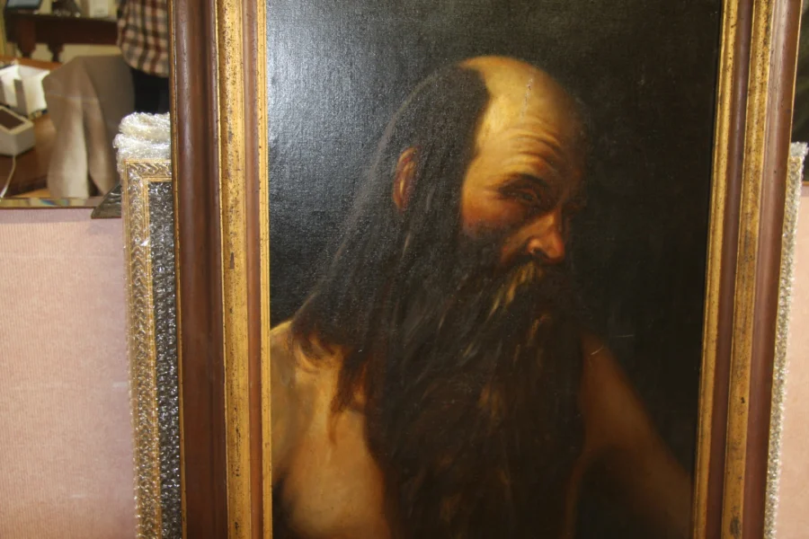 Huile sur toile présentant un ermite. Très bon état