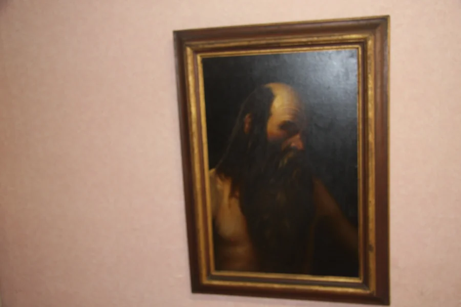 Huile sur toile présentant un ermite. Très bon état