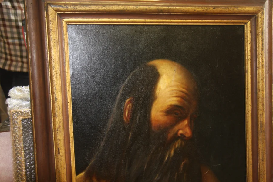 Huile sur toile présentant un ermite. Très bon état