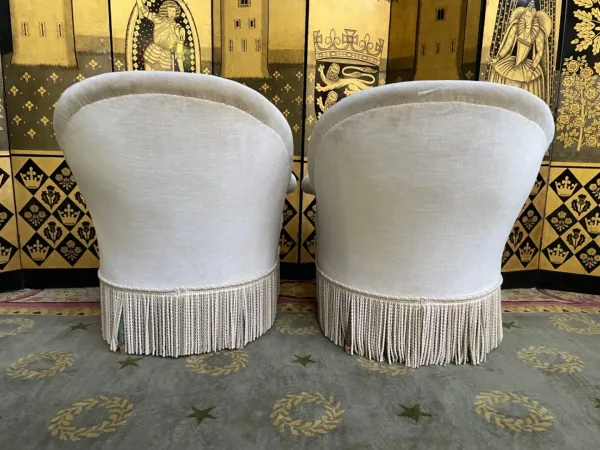 Paire de fauteuils crapaud en velours beige