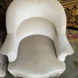 Paire de fauteuils crapaud en velours beige
