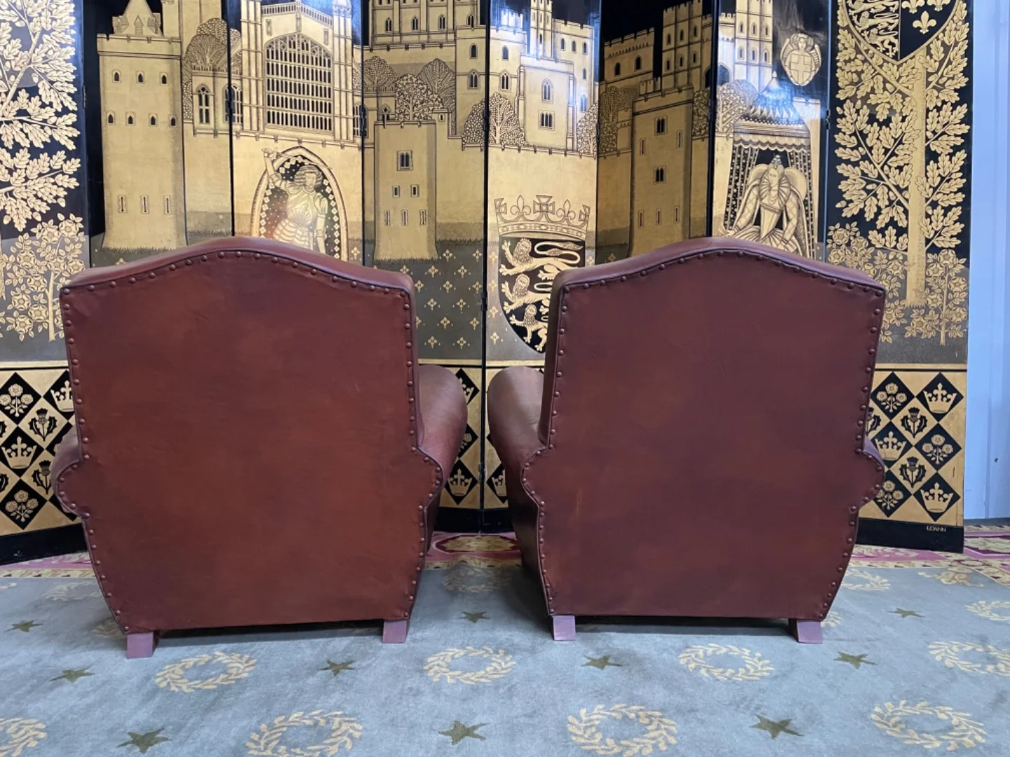 PAIR OF LEATHER ARMCHAIRS