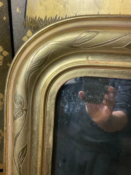 Miroir époque Louis Philippe en bois doré