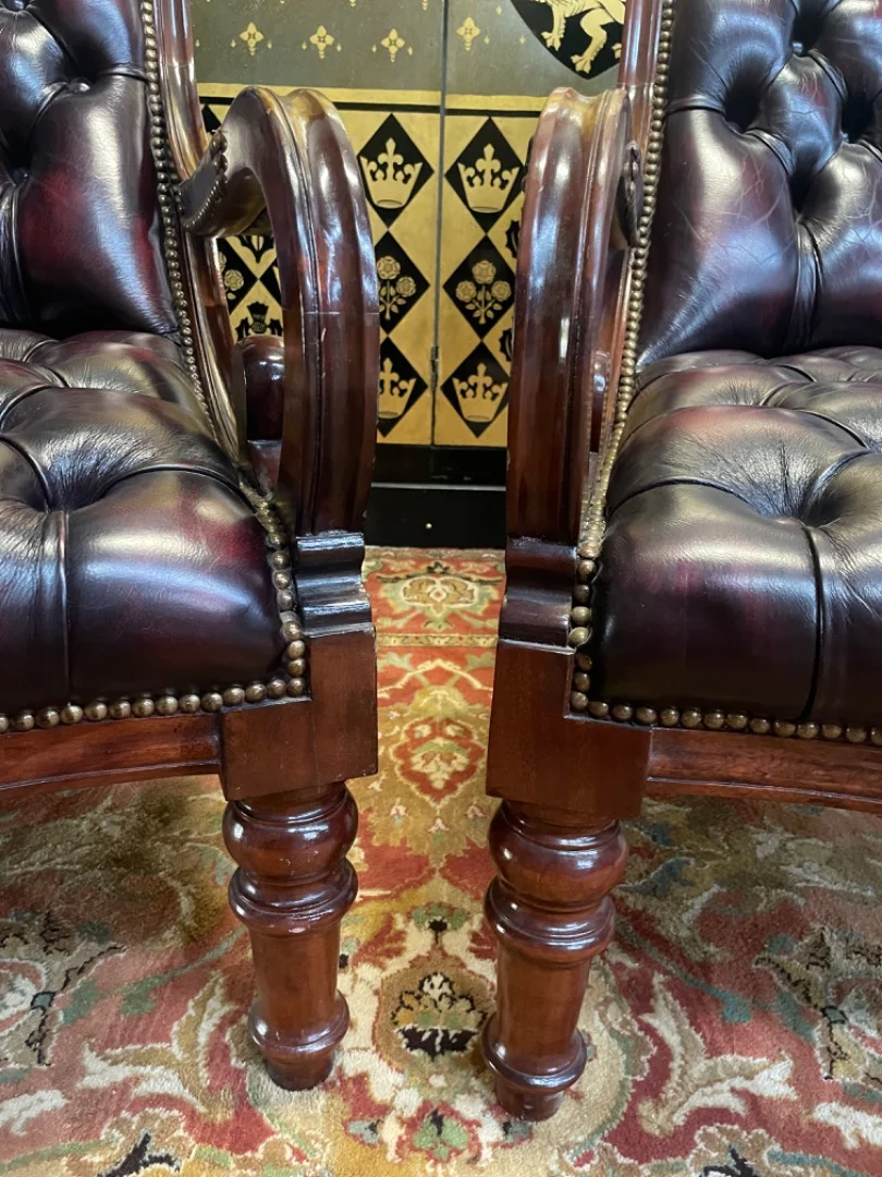 PAIR OF LEATHER ARMCHAIRS