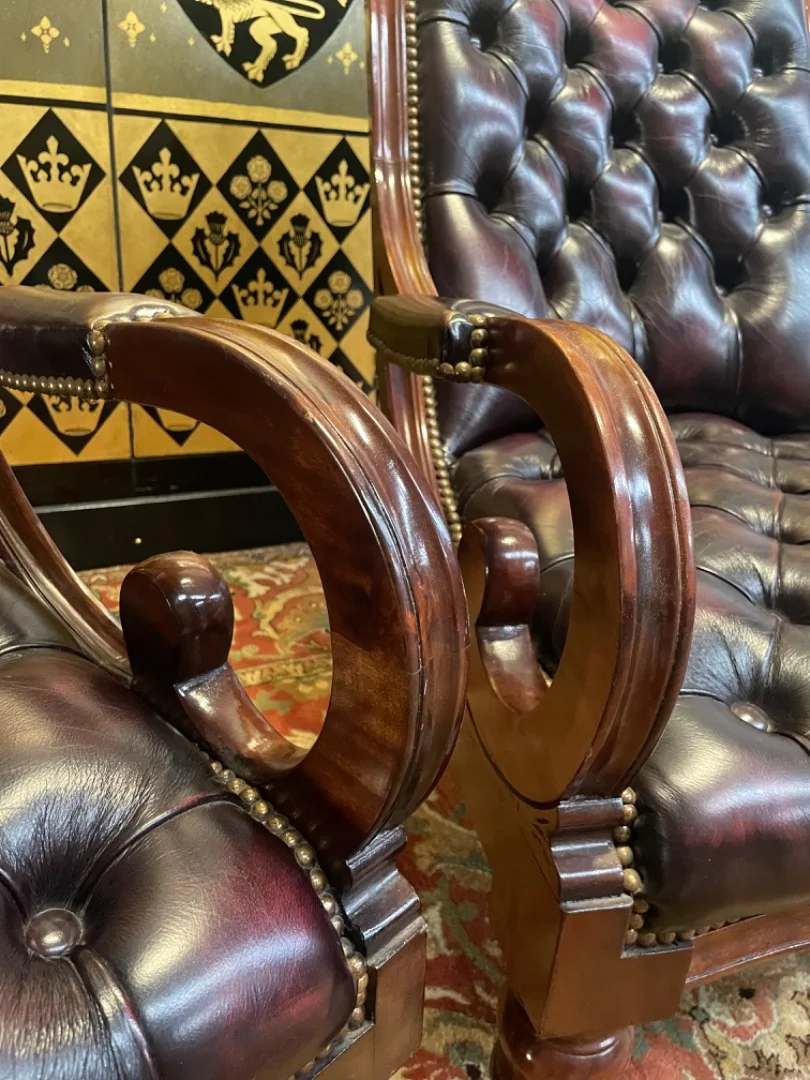 PAIR OF LEATHER ARMCHAIRS