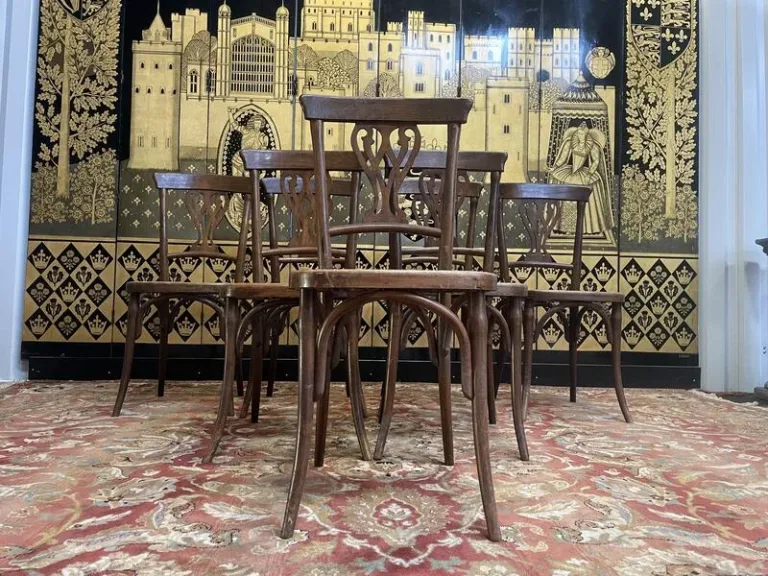 Set of 7 Baumann / Thonet / Fischel caned bistro chairs