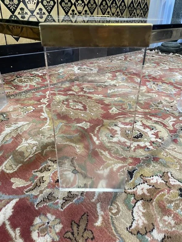 Plexiglass and brass coffee table