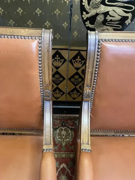 Pair of Louis XVI style leather armchairs