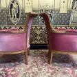 Paire de fauteuils - bergères de style Louis XVI