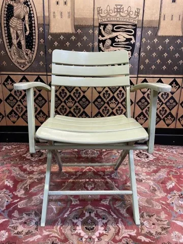 Suite de 10 fauteuils de jardin signé Herlag