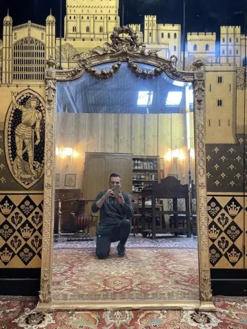 Miroir de style Louis XVI en bois doré