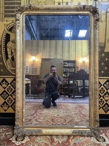 Miroir de style Napoléon III en bois doré