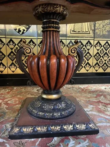 Oval oak dining table with vase legs
