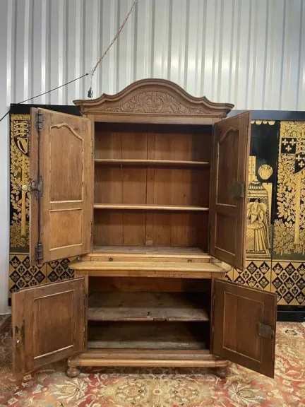 Two-body Renaissance carved oak sideboard