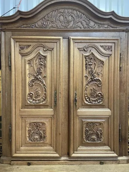 Two-body Renaissance carved oak sideboard