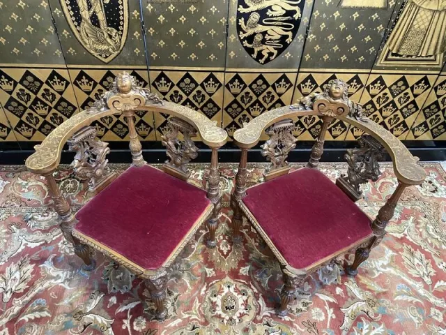 Pair of Italian carved wooden armchairs